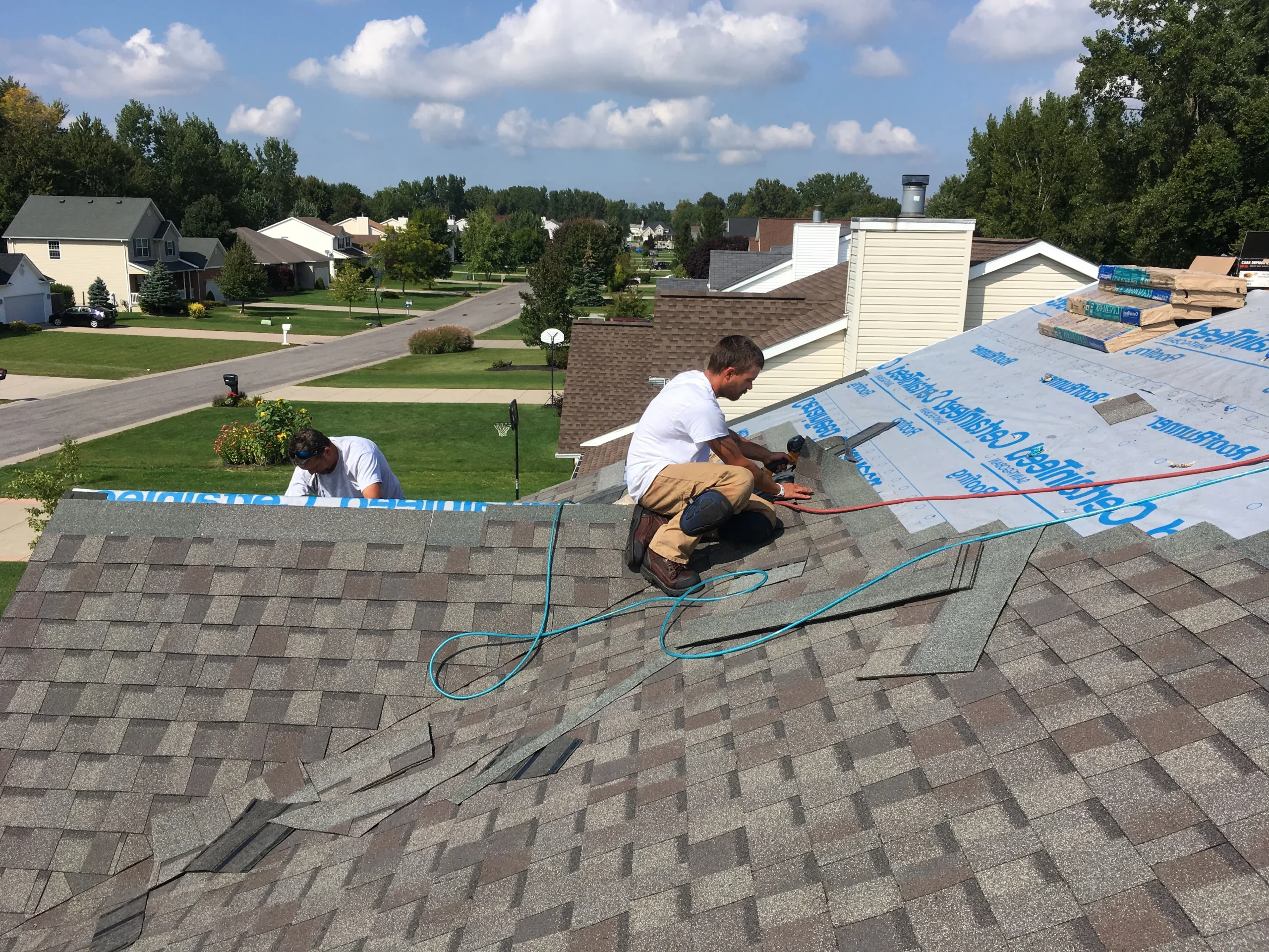 asphalt shingle, metal, and tile roofing options near me compared on countertop