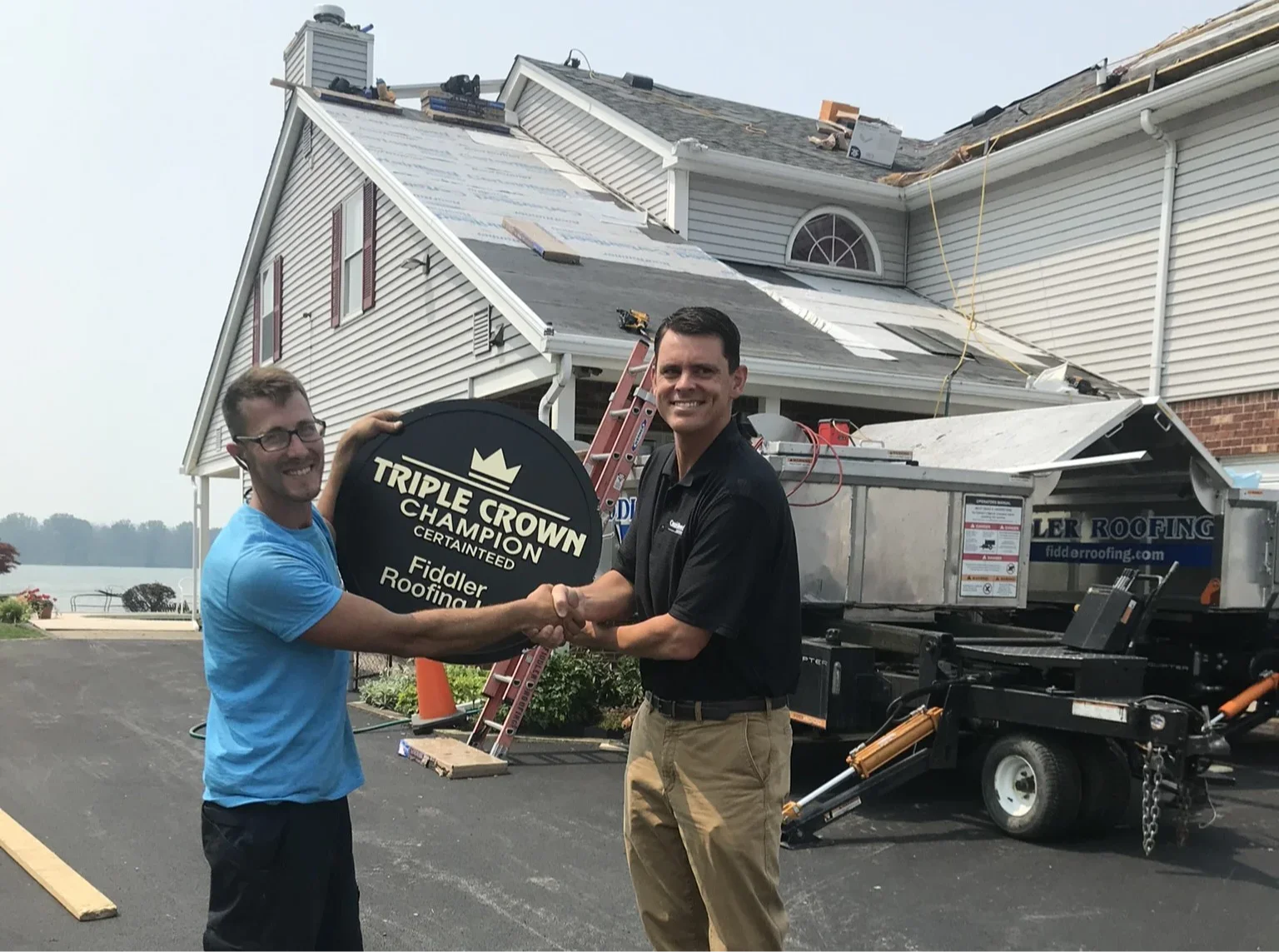 Experienced roofing contractor with detailed roofing diagram, sharing expert insight on avoiding roofing myths.